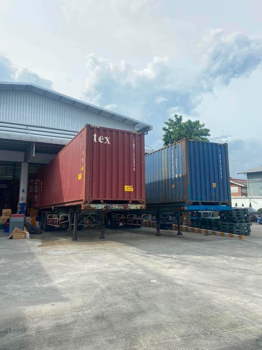 Export containers loading at the A.B.K. Auto Parts warehouse in Thailand